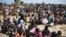 FILE - Some of more than 30,000 people who flocked into Leer town, South Sudan, to receive food from the International Committee of the Red Cross, Dec. 15, 2015, which marks the two-year anniversary of South Sudan's civil war. 