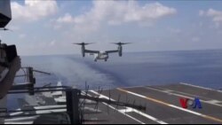 美防长在南中国海视察航母