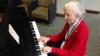 Cerlene Rose plays piano every Friday in the lobby of Sibley Hospital in Washington, D.C. (J. Taboh/VOA)