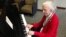 Cerlene Rose plays piano every Friday in the lobby of Sibley Hospital in Washington, D.C. (J. Taboh/VOA)