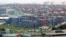 FILE - A container port in Shanghai, Aug. 11, 2009. China's trade surplus with the United States rose in June, but analysts are expecting a less favorable trade balance for China in the coming months.