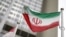 FILE: The Iranian flag flies in front of the U.N. nuclear watchdog (IAEA) headquarters in Vienna, Austria, May 24, 2021. 