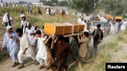President Barack Obama waves before giving his State of the Union address before a joint session of Congress on Capitol Hill in Washington, Jan. 20, 2015.