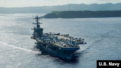 美军“罗斯福”号（USS Theodore Roosevelt）航母2020年5月21日驶离关岛，前往菲律宾海执行任务。