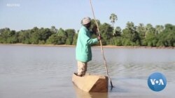 As Temperatures Rise, Water Evaporates in Mali Lake Giving Fisherman Hope