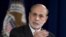 Federal Reserve Chairman Ben Bernanke gestures as he speaks during a news conference at the Federal Reserve Board in Washington, December 12, 2012.