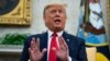 FILE - President Donald Trump speaks during a meeting in the Oval Office of the White House, Feb. 12, 2020, in Washington. 