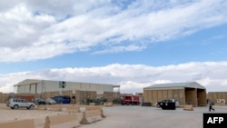 FILE - Buildings are seen during a press tour inside Al Asad military airbase in the western Iraqi province of Anbar, Jan. 13, 2020.