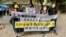 社民连4名成员3月17日早上游行抗议北京大幅修改香港选举制度，搞小圈子选举 (美国之音/汤惠芸)