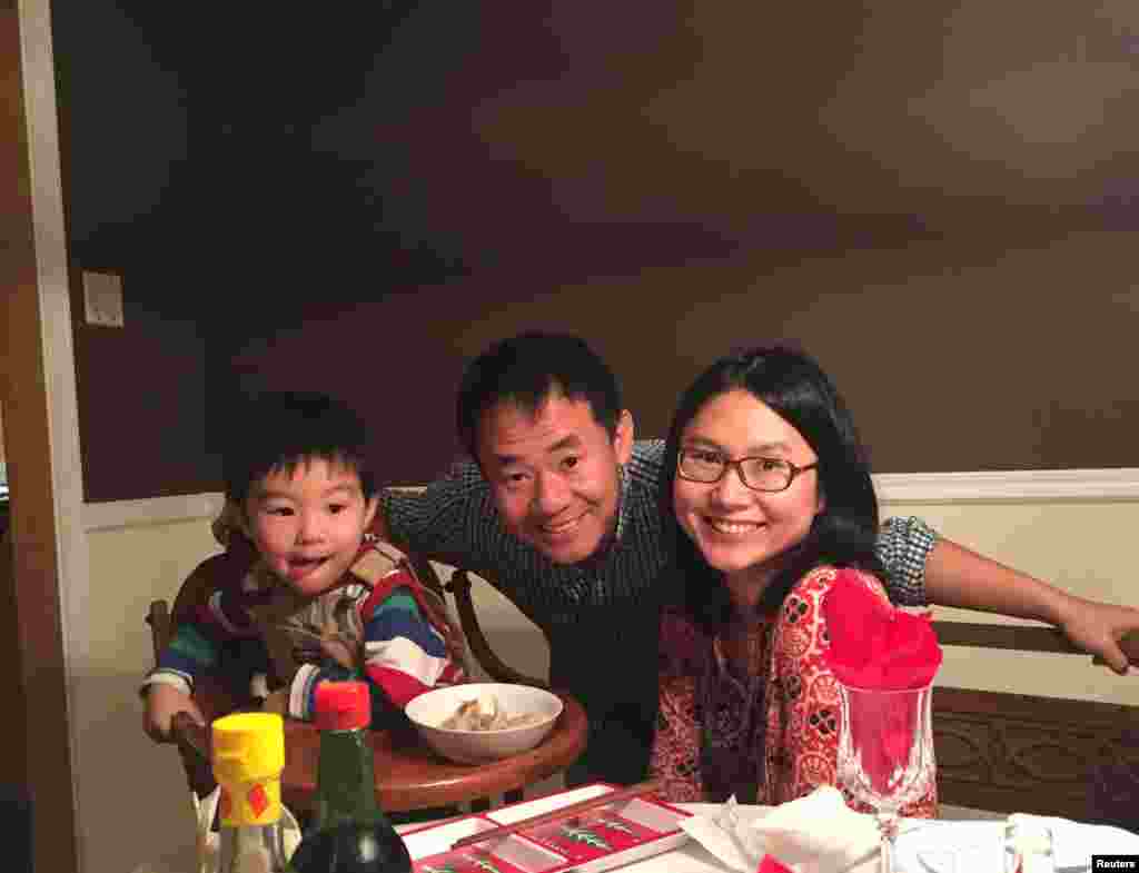 Xiyue Wang, a naturalized American citizen from China who was arrested in Iran in August 2016 while researching his doctoral thesis at Princeton University, is shown with his wife and son in in Princeton, N.J.