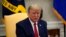 President Donald Trump speaks during a meeting about the coronavirus response in the Oval Office of the White House, May 7, 2020, in Washington. 