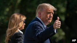 Presidente Donald Trump e primeira dama Melania Trump