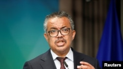 WHO chief Tedros Adhanom Ghebreyesus gives a statement on the coronavirus disease vaccination, during a European Union and African Union summit, in Brussels, Belgium Feb. 18, 2022.