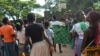 A group of young girls in Malawi at a basketball court in Blantyre. (Lameck Masina for VOA News)