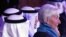 The head of the International Monetary Fund, Christine Lagarde, right, attends an international conference on Islamic finance, in Kuwait City, Nov. 11, 2015.