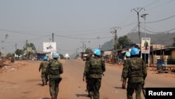Peacekeepers from the United Nations patrol the streets a few hours after the attacks in Begoua, a northern district of Bangui, Central Africa Republic, Jan. 13, 2021. 