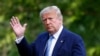 President Donald Trump walks on the South Lawn of the White House in Washington, Sunday, June 14, 2020, after stepping off Marine One as he returns from his golf club in New Jersey. 