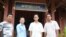 From left to right: Touch Pav, Popel commune chief, and Khun Vannoeurn, second deputy commune chief from the ruling Cambodian People’s Party, are pictured with other commune councilors in front of the commune hall in Tram Kak district of Takeo, Cambodia, Friday, January 5, 2018. (Sun Narin/VOA Khmer)