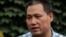FILE - Chinese human rights lawyer Pu Zhiqiang faces trial Monday for allegedly using social media to incite hatred and violence. He's shown in Beijing, July 20, 2012.