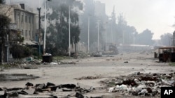 Une rue de Damas, près de la place Abbassiyin le 20 mars 2017, après que des affrontements aient éclaté entre les forces gouvernementales syriennes et les rebelles.