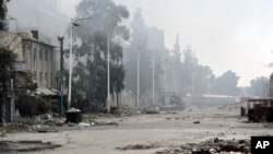 Wurin da dakarun gwamnatin Syria da 'yan tawaye suka gwabza fada a birinin Damascus