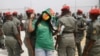 Gendarmerie search Cameroon soccer fans outside the stadium before the African Cup of Nations 2022 quarterfinal match between Gambia and Cameroon at Japoma Stadium, Douala, Cameroon, Jan. 29, 2022.