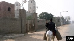 Dans le village d'Akhmim, à quelque 400 km au sud du Caire, en Egypte, le 3 janvier 2000.