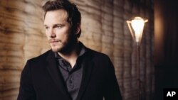 Actor Chris Pratt, shown during a press day for "Jurassic World" at Universal Studios in Universal City, Calif., on June 6, 2015, says that to play the role of raptor trainer Owen, he embraced the "swagger" of the hero of one of Spielberg's most recogniza