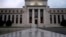 FILE - U.S. Federal Reserve building in Washington.