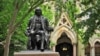 Statue of Benjamin Franklin in front of College Hall