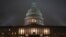 FILE - The U.S. Capitol in Washington is shrouded in mist, Dec. 13, 2019, at the end of an acrimonious week of partisan disputes in the House Judiciary Committee, which approved two articles of impeachment against President Donald Trump.