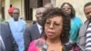 Cameroon's minister of secondary education, Nalova Lyonga, speaks to the media after encouraging protesting teachers to return to school, in Buea, Cameroon, July 17, 2019. (Moki Kindzeka/VOA)