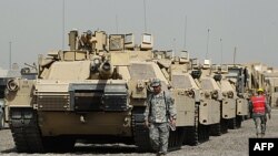 Baş nazir Məliki:ABŞ-ın əsgərləri İraqdan çıxarmaq qərarı hüquqi toxunulmazlıq məsələsi ilə bağlıdır