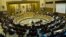 FILE - Representatives of Arab League countries are seen meeting at the group's headquarters in Cairo, Egypt. 