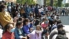 Former Naga World employees gather in front of the Ministry of Labor building to petition for the government's help after being suspended from their jobs during the COVID-19 pandemic, Phnom Penh, Cambodia, June 16, 2020. (Malis Tum/VOA Khmer) 