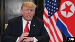 도널드 트럼프 미국 대통령이 지난 6월 싱가포르에서 열린 첫 미-북 정상회담에서 발언하고 있다.