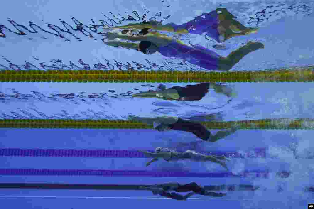 Perenang-perenang dari atas ke bawah;&nbsp; Perenang Uzbekistan Shokhsanamkhon Toshpulatova, perenang Ukraina Anna Stetsenko, perenang Polandia Joanna Mendak, perenang Uzbekistan Muslima Odilova dan Fotimakhon Amilova bertanding dalam nomor 100 m Gaya Bebas Wanita di Pertandingan Paralympic di Rio de Janeiro, Brazil.