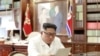  North Korean leader Kim Jong Un reads a letter from U.S. President Donald Trump, in Pyongyang, North Korea, in this picture released by North Korea's Korean Central News Agency, June 22, 2019.