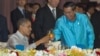U.S. President Barack Obama, left, toasts with Cambodia's Prime Minister Hun Sen at the East Asia Summit Dinner during the East Asia Summit at the Diamond Island Convention Center in Phnom Penh, Cambodia, Monday, Nov. 19, 2012. (AP Photo/Carolyn Kaster)