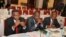 From left to right, Burundi opposition members, Ndikumana Delphine, Deputy Secretary General of the United For National Progress, Rwasa Agaton and Leonce Ngendawmana both members of the National Front of Liberation party, sit, during Burundi peace talks