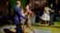 President Barack Obama and first lady Michelle Obama do the tango with dancers during a state dinner at the Centro Cultural Kirchner, March 23, 2016, in Buenos Aires, Argentina.