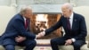 US President Joe Biden shakes hands with US President-elect Donald Trump during a meeting in the Oval Office of the White House in Washington, DC, on November 13, 2024.
