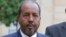 FILE - Somalia President Hassan Sheikh Mohamud addresses the media following his meeting with French President Francois Hollande at the Elysee Palace in Paris.