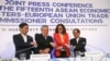 From left; Vietnam's Minister of Industry and Trade Tran Tuan Anh, Secretary of the Philippine Department of Trade and Industry and Chair of the ASEAN Economic Ministers (AEM) Meeting Ramon Lopez, Commissioner for Trade, European Union Cecilia Malmstrom and ASEAN Secretary General Le Luong Minh link arms following a news conference during the ongoing 15th ASEAN Economic Ministers-European Union Trade Consultations, Friday, March 10, 2017, in Pasay city, Philippines. In their statement, the AEM-EU meeting said they "discussed various projects on trade facilitation, Intellectual Property Rights, air transportation and statistics and integration monitoring." (AP Photo/Bullit Marquez)