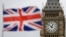 FILE - British Union flag waves in front of the Elizabeth Tower at Houses of Parliament containing the bell know as "Big Ben" in central London, March 29, 2017. 