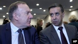 FILE - French businessmen leader Pierre Gattaz, left, and head of Algeria's Business leaders Ali Haddad attend an Algeria-France economic forum in Algiers, Feb.7, 2018. 