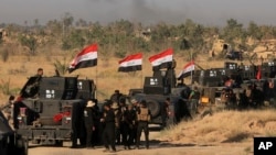 پیشمرگه‌‌های کرد از شمال و سربازان عراقی از جنوب به سمت شهر موصل در حال پیشروی اند 