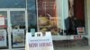 A "Now Hiring" sign sits outside a business in Prince William County in Virginia, June 20, 2021. (Photo: Diaa Bekheet)