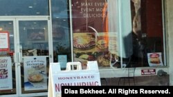 A "Now Hiring" sign sits outside a business in Prince William County in Virginia, June 20, 2021. (Photo: Diaa Bekheet)