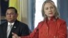 U.S. Secretary of State Hillary Clinton (R) speaks to reporters next to Burma's Foreign Minister Wunna Maung Lwin after their meeting at the State Department in Washington, May 17, 2012. 